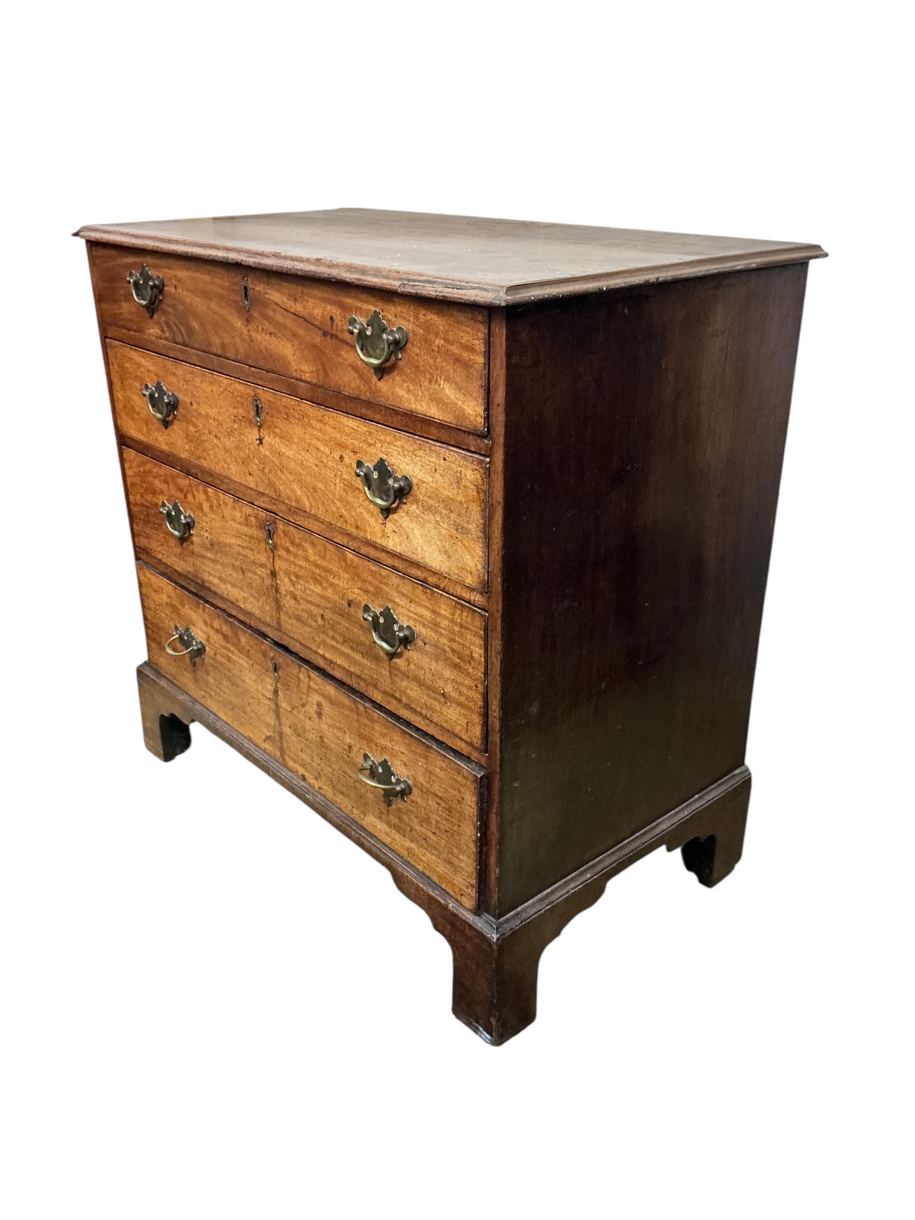 A George III mahogany chest of two short and three long graduated drawers, width 86cm, depth 49cm, height 85cm